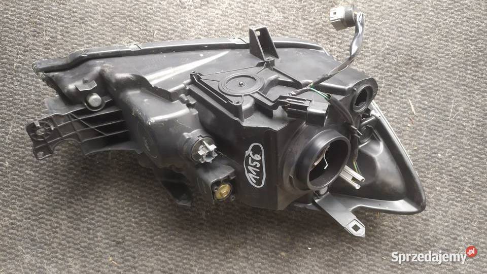 Mitsubishi Lancer 2003 2006 lampa lewa ciemna Oświetlenie Byków