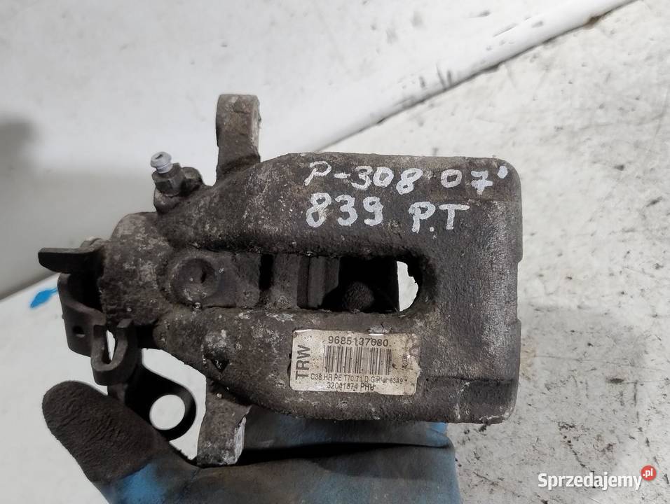 ZACISK HAMULCOWY PRAWY TYŁ PEUGEOT 308 I