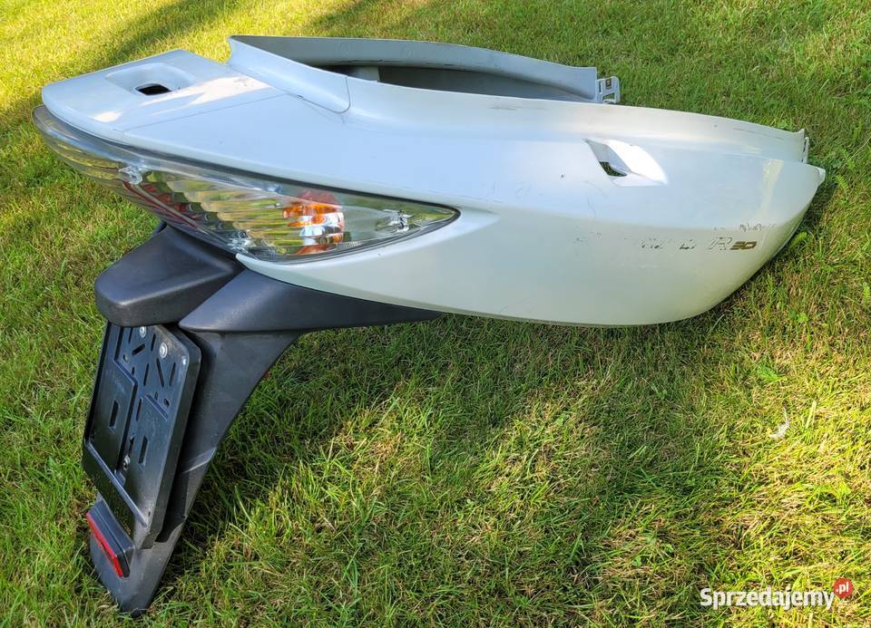 KOMPLET ZADUPEK MIGACZ LAMPA BOKPLASTIK KYMCO Części i akcesoria motocyklowe wielkopolskie