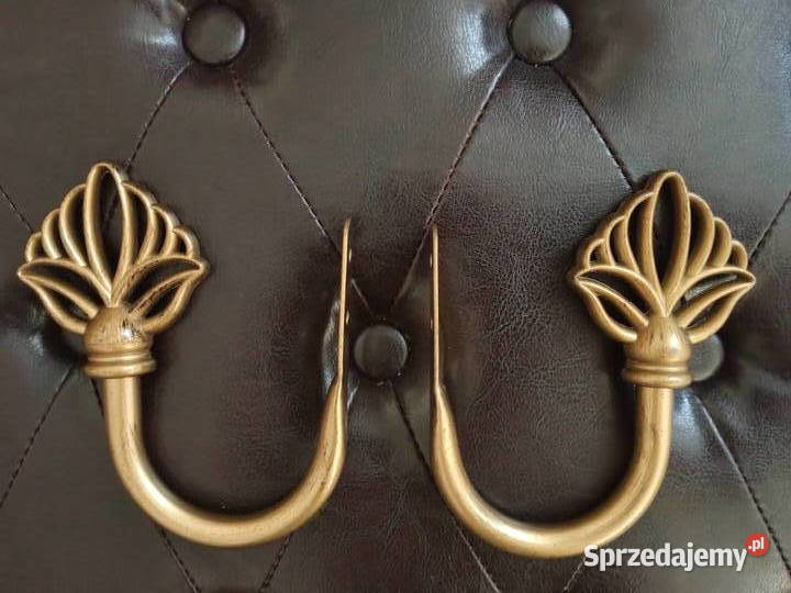 metalowe uchwyty do zasłon