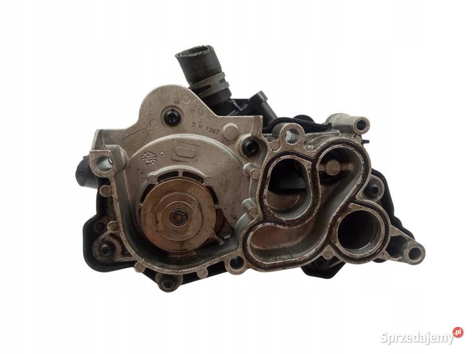 OBUDOWA TERMOSTATU POMPA WODY 04C121121C 10 MPI