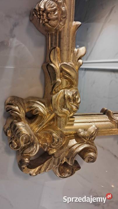 Lustro w złotej oprawie Warszawa