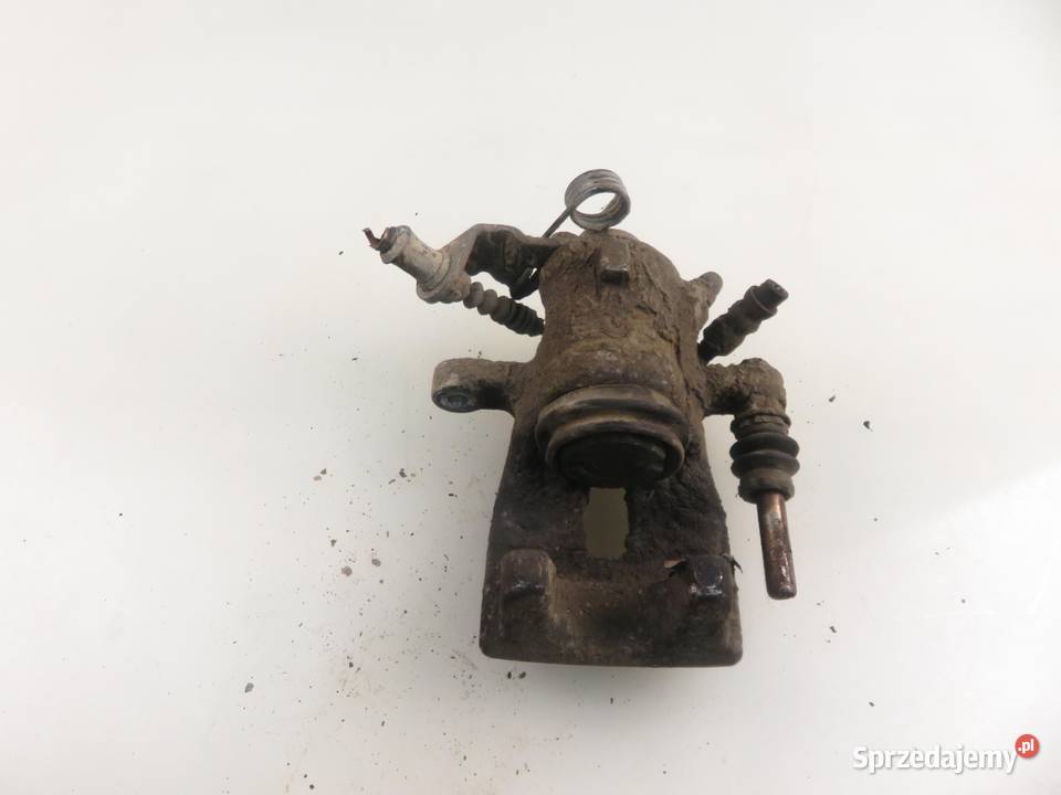 ZACISK LEWY TYŁ OPEL COMBO C 13 CDTI 16V Z 13 osobowe