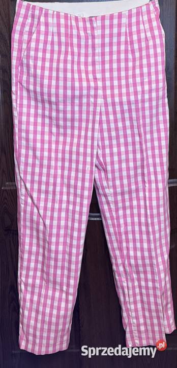 Spodnie damskie w różowobiałą kratkę Spodnie mazowieckie Pruszków