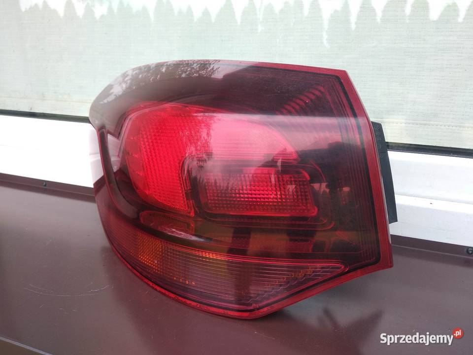 Opel Astra J kombi lampa tył tylna lewa narożna Sieradz