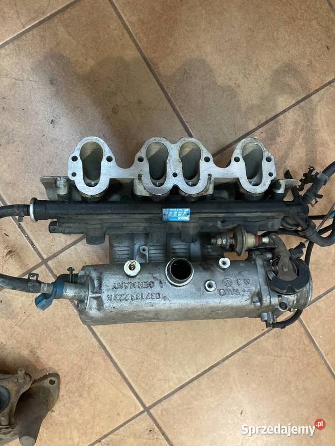 037133223K Kolektor ssący VW Passat B5 20