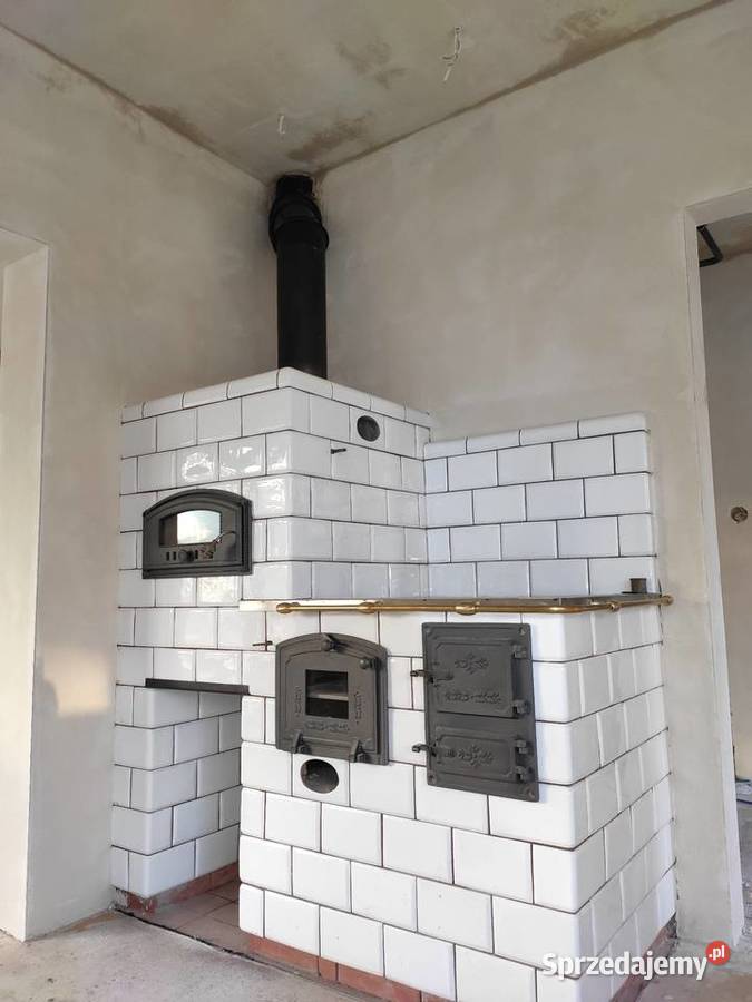 Montaż kozy piecyka pieca wkładu komina