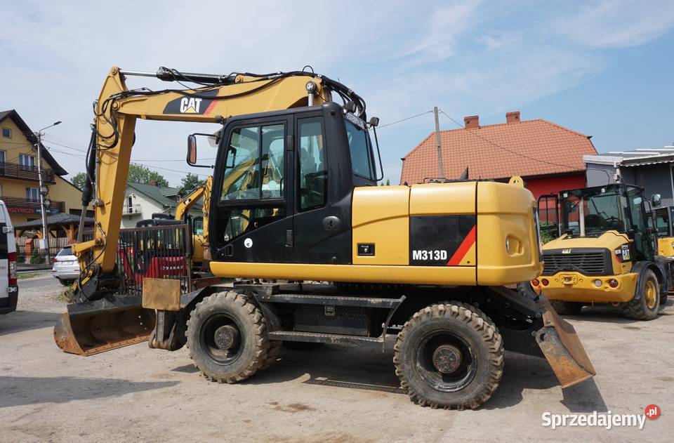 Koparka kołowa CAT M 313 D 2010 Jeziorko sprzedam