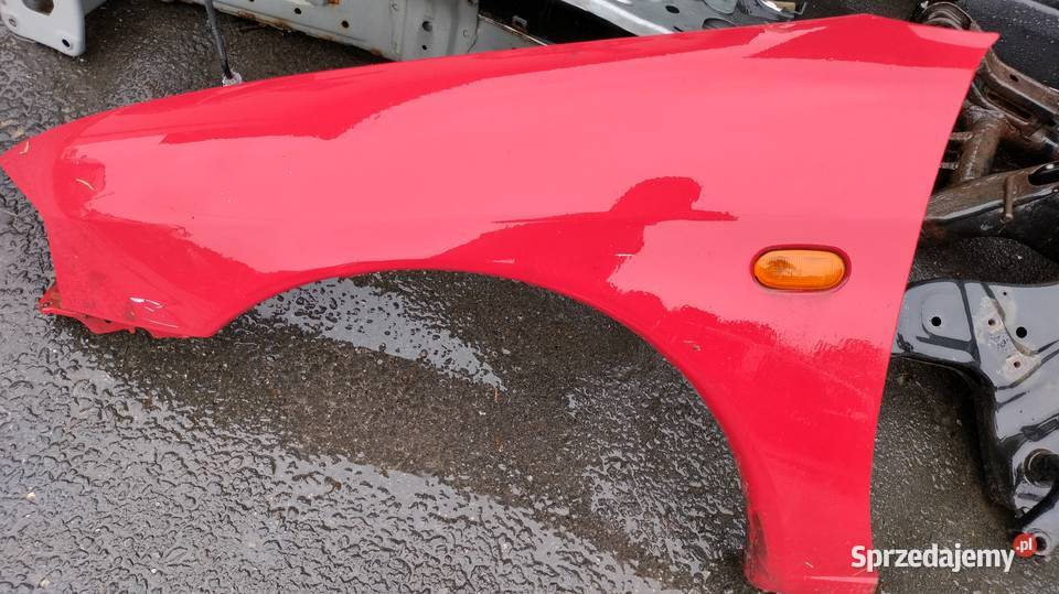 Błotnik lewy Mitsubishi Colt Błotniki śląskie Dębowiec
