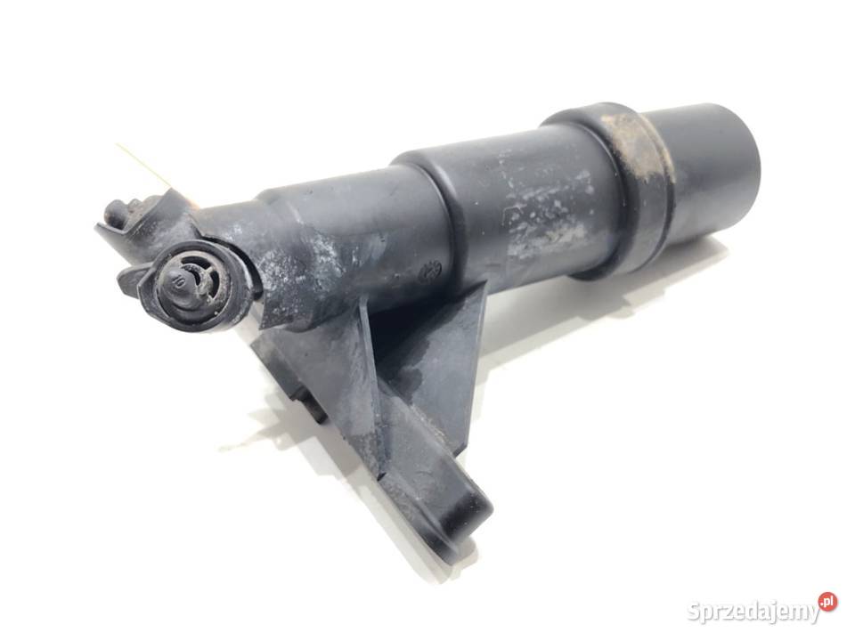 SPRYSKIWACZ REFLEKTORA LEWY PRZÓD BMW E61 Kombi