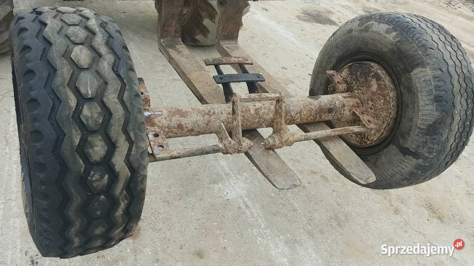 Oś koła rozrzutnika przyczepy Zaręby Kościelne