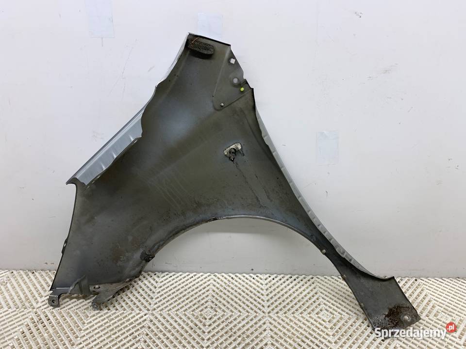 BŁOTNIK PRAWY PRZÓD NISSAN NOTE E11 Hatchback