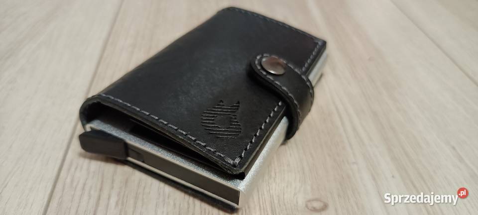 Skórzanometalowy portfel męski z RFID