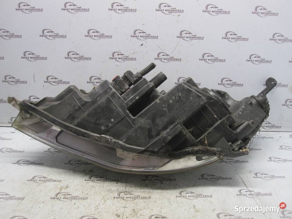 Opel Astra J 2012 lampa prawa przód 13253657