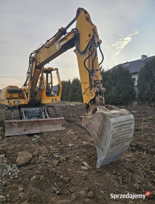Usługi koparką budowa stawów i zbiorników