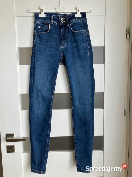 Jeansy rurki Guess Jeans wysoki stan skinny nowe Spodnie podkarpackie Nisko