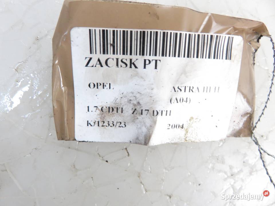 ZACISK PRAWY TYŁ OPEL ASTRA III H