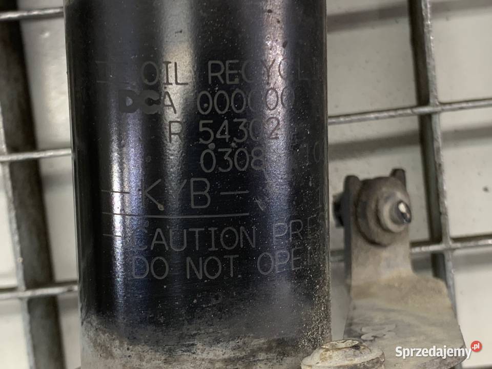 AMORTYZATOR PRAWY PRZÓD ZE SPRĘŻYNĄ RENAULT osobowe