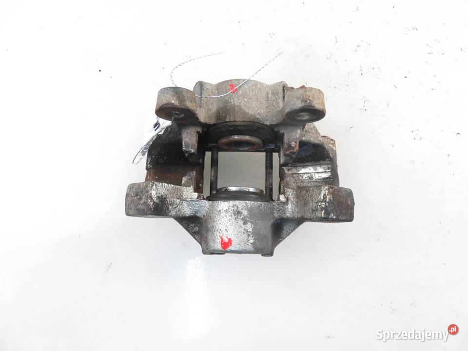 ZACISK LEWY TYŁ VOLVO V70 I 24