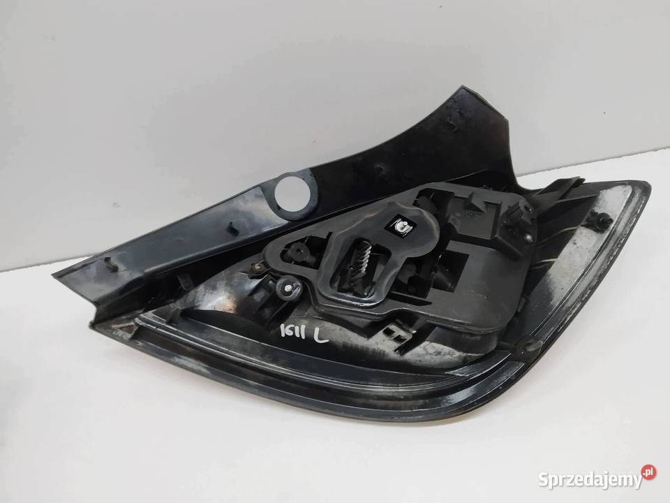 LAMPA TYŁ LEWA 5D HB 24451835 Opel Astra III