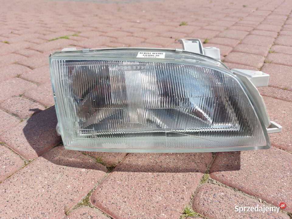 Lampa reflektor przód prawa toyota Carina e Sędziejowice sprzedam