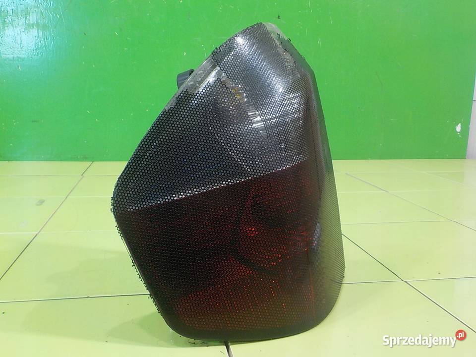 BMW X3 E83 30 B 04r 5D lampa lewa tyl Suków