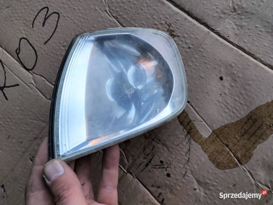 KIERUNKOWSKAZ LEWY Volkswagen Polo 963999 osobowe Oświetlenie Kamień-Kolonia