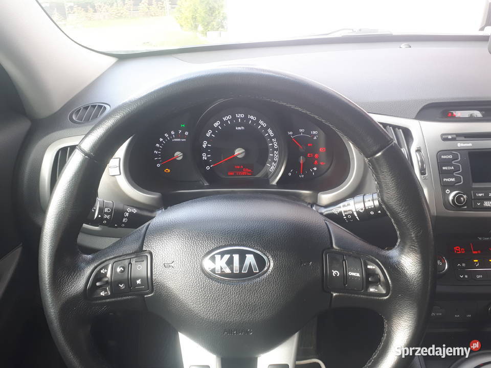 Kia Sportage 16 benzyna Biala perła komplet opon Połupin