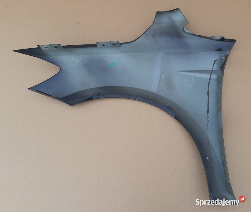 VW GOLF VII SPORTSVAN BŁOTNIK PRAWY PRZÓD Bieleń