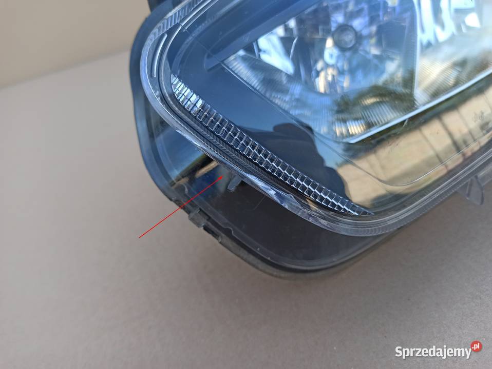 FORD TRANSIT COURIER REFLEKTOR LEWY LAMPA LEWA Trzciel