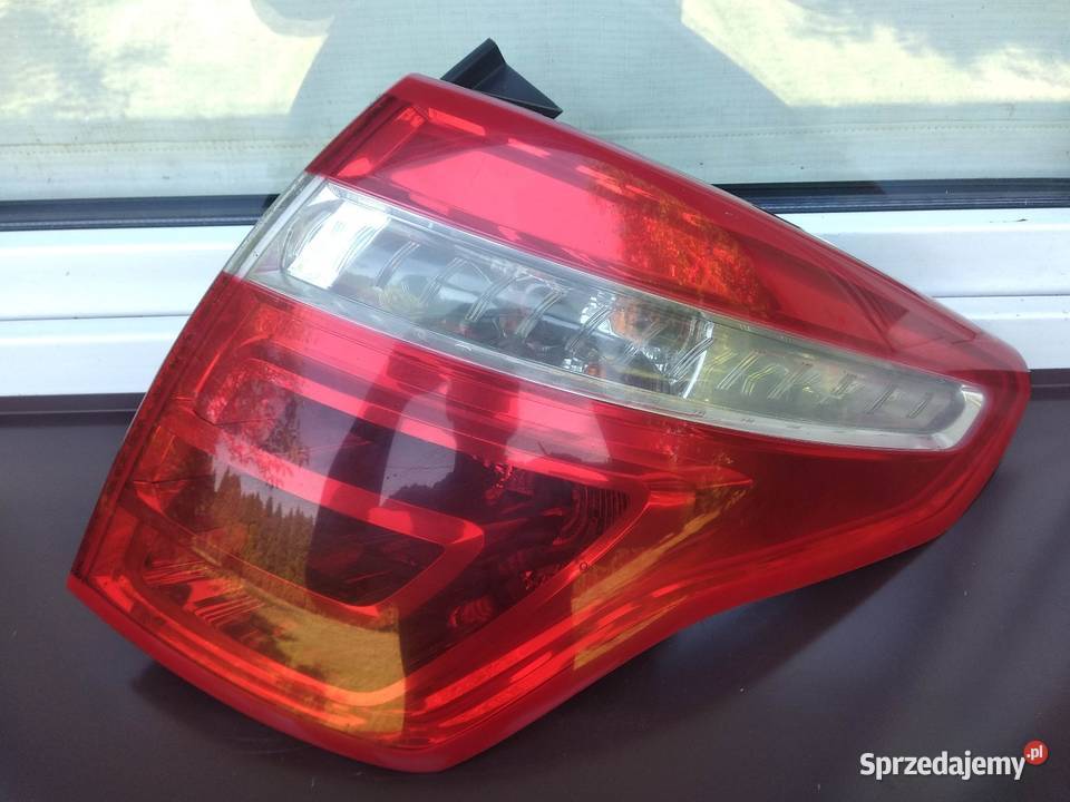 Citroen C4 Picasso I 0610 lampa tył tylna lewa w łódzkie Sieradz
