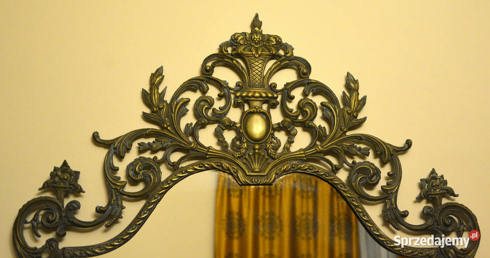 Lustro z metalową odlewaną rokokową ramą
