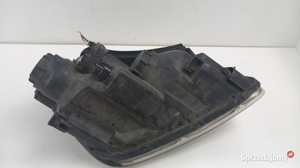 KIA CARENS III LAMPA PRZÓD LEWA SOCZEWKA