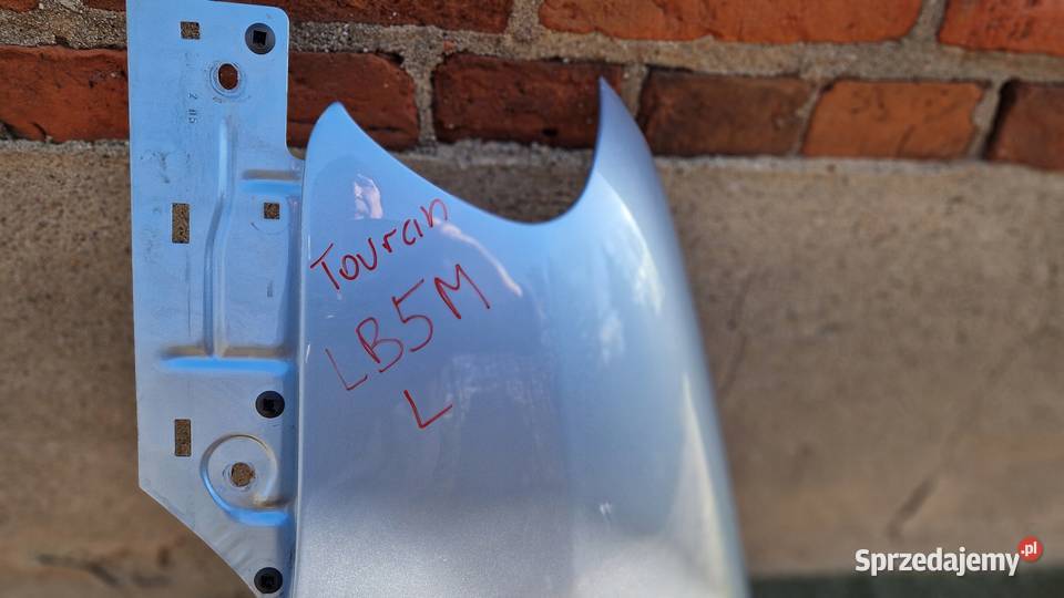 VW TOURAN BŁOTNIK PRZÓD PRZEDNI LEWY KOD LAK Słowikowo