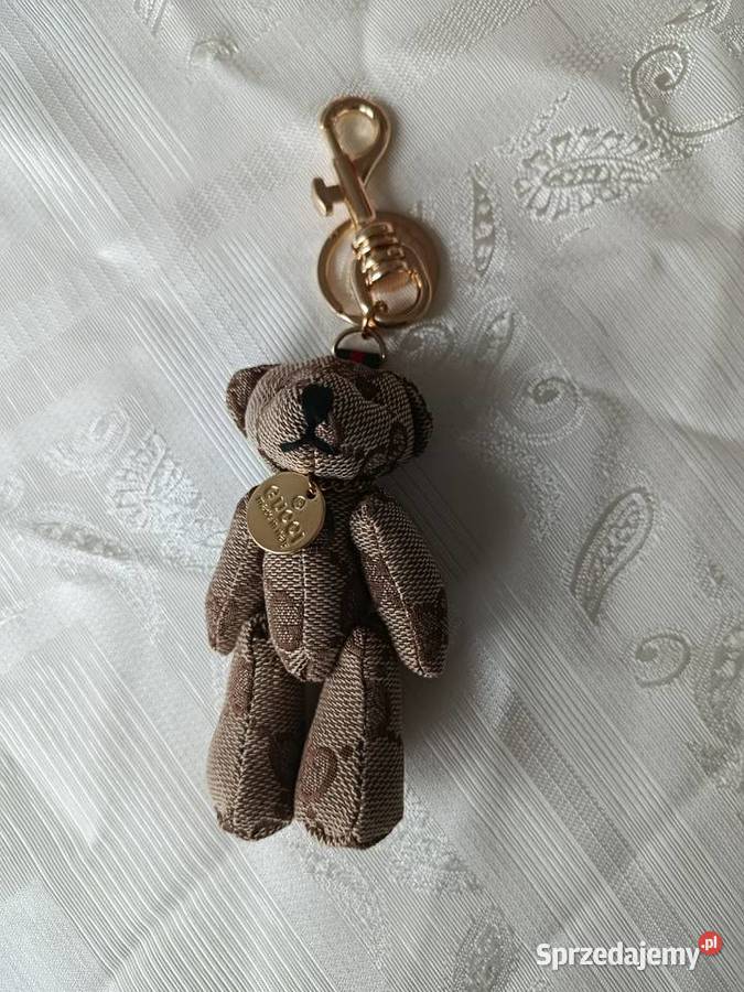 Brelok luksusowej marki Gucci przypięcie na Białystok