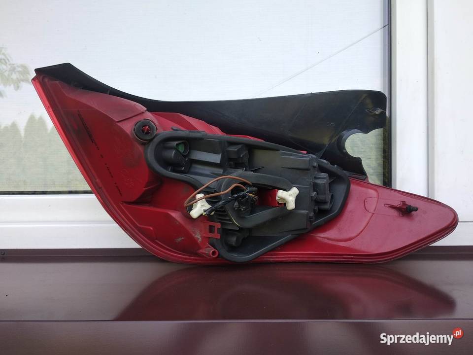 Peugeot 308 T7 hatchback lampa tył tylna lewa