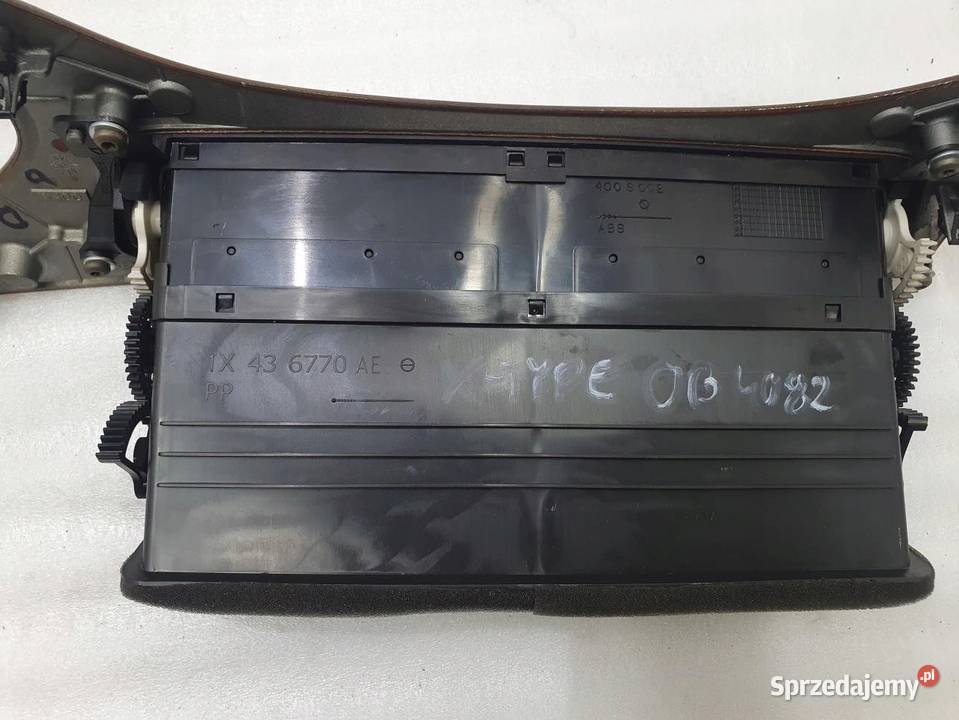 LISTWA RAMKA LICZNIKA JAGUAR XTYPE 1X43F045H48AK Osłony i zaślepki wielkopolskie