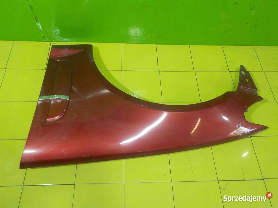 JAGUAR XF X250 I 08r blotnik lewy przod Suków