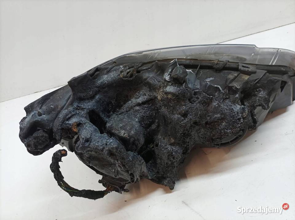 LAMPA PRZÓD LEWA XENON EU USZKODZONA Bmw X5 II osobowe sprzedam