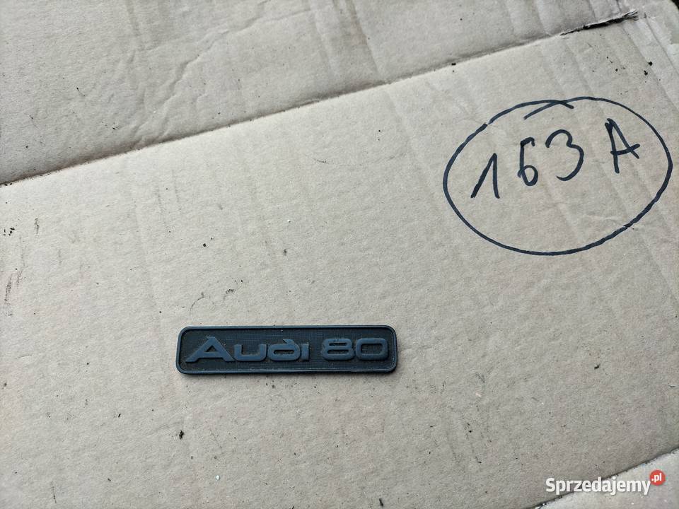 ZNACZEK EMBLEMAT NAPIS KONSOLI AUDI 80 Kamień-Kolonia
