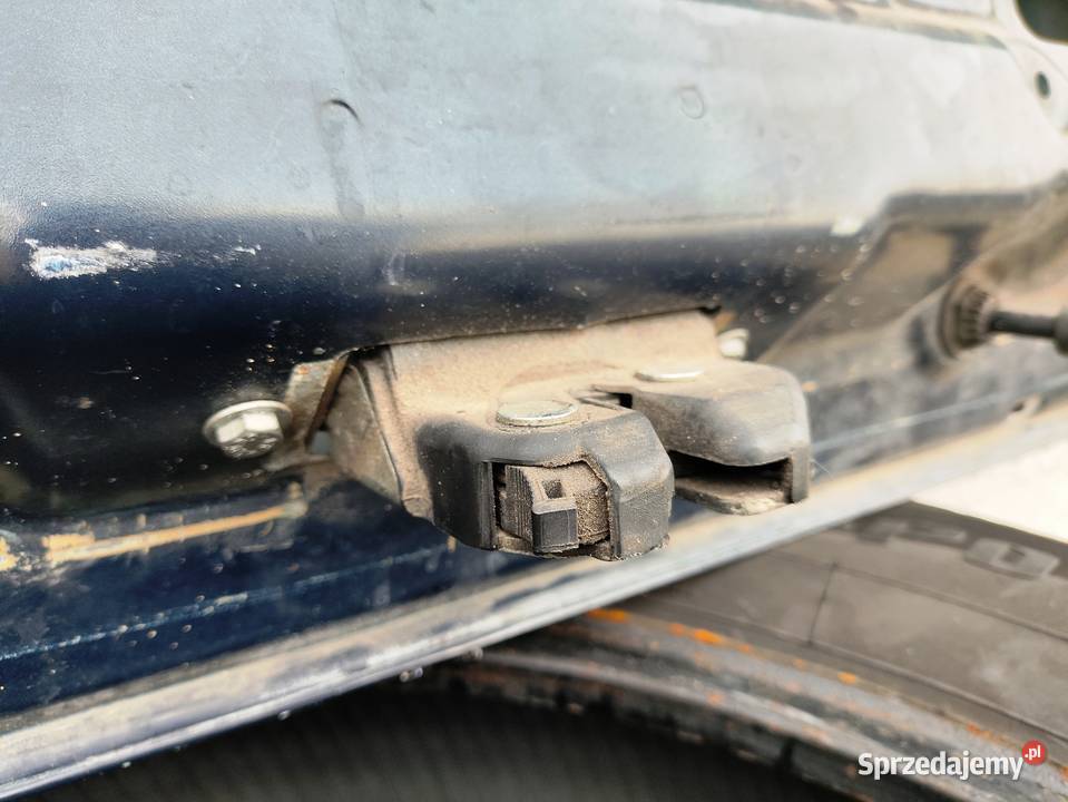 ORYGINAŁ Zamek klapy bagażnika Fiat Grande Punto śląskie