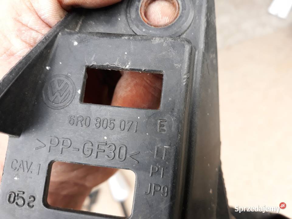 VW POLO 6R ŚLIZG POD LAMPĘ LEWY UCHWYT PRZÓD Międzychód