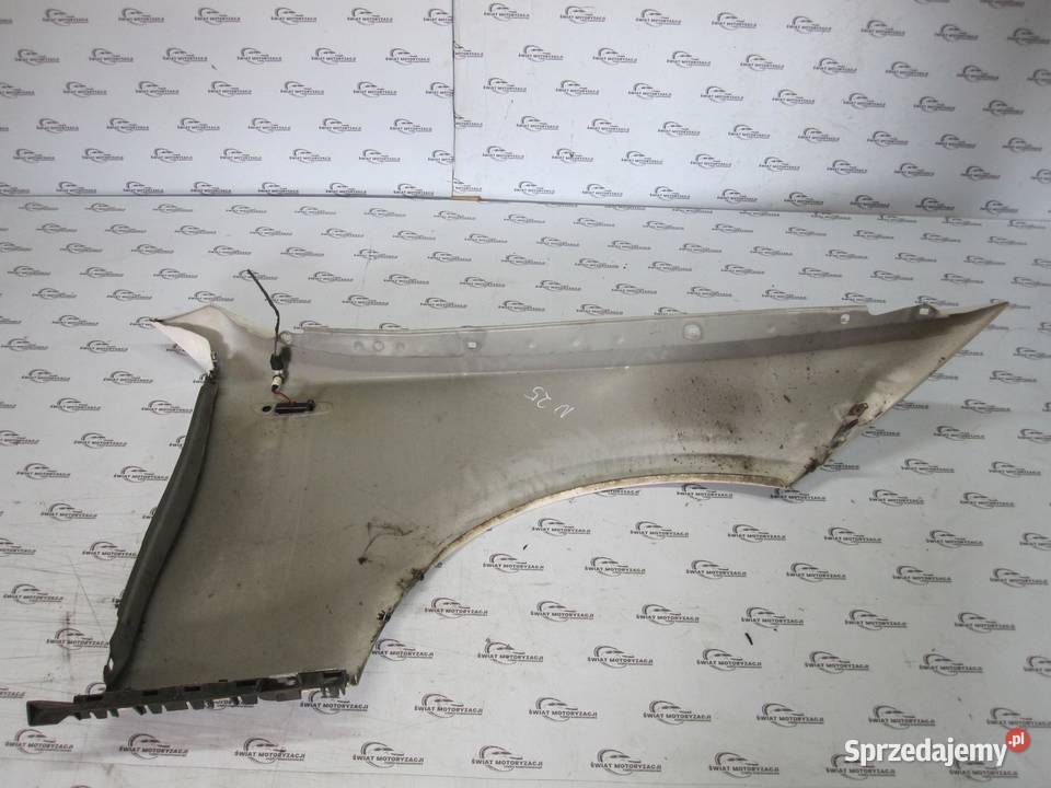 BMW E82 10r błotnik lewy przód