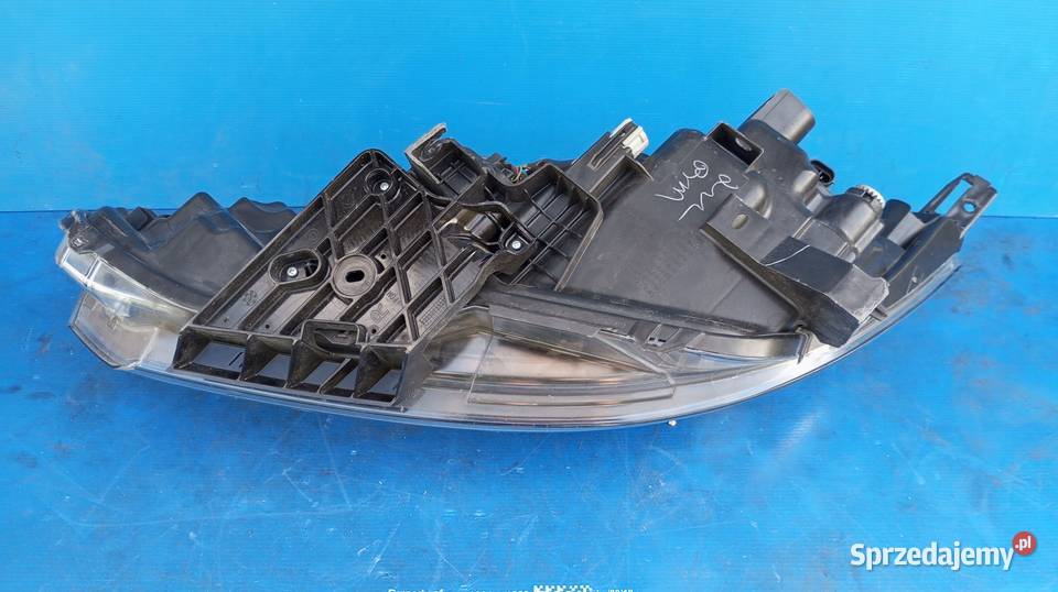 LAMPA REFLEKTOR PRAWY PRZÓD EU 10019009 NISSAN osobowe wielkopolskie Nowy Tomyśl