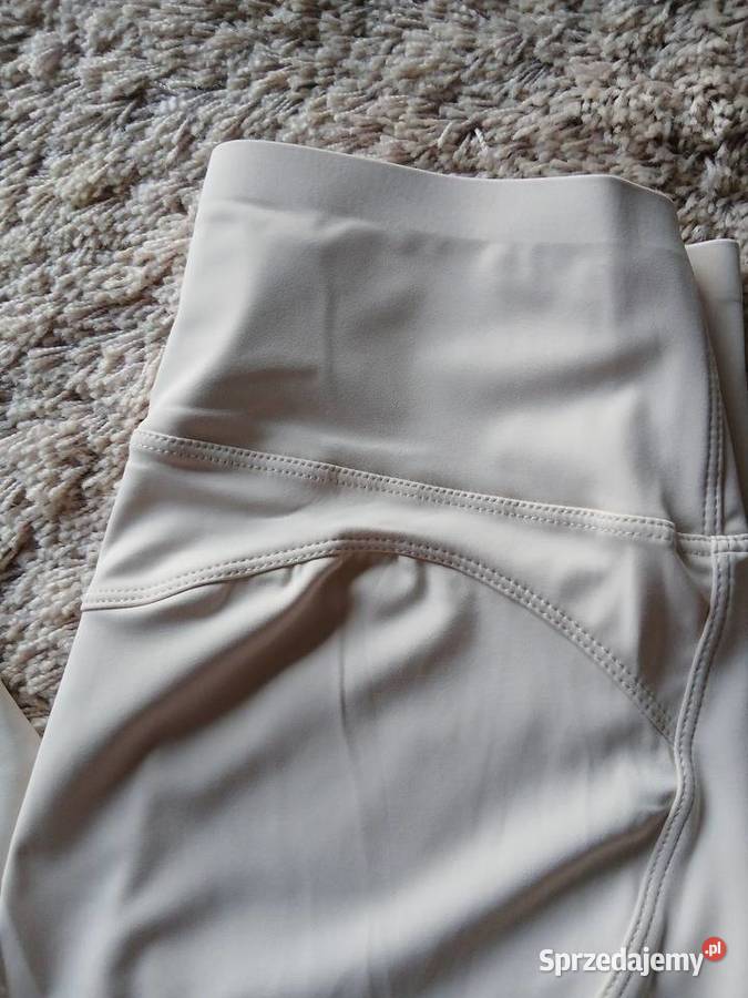 Sportowe leginsy bezowe Lxl Legnica