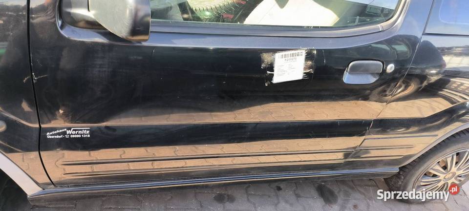 DRZWI LEWE PRZÓD SUZUKI IGNIS 2001 osobowe