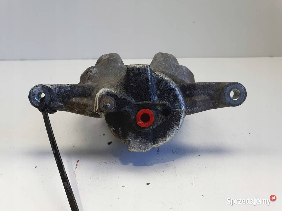 Toyota Corolla XII E21 PRZEDNI ZACISK HAMULCOWY Rudka