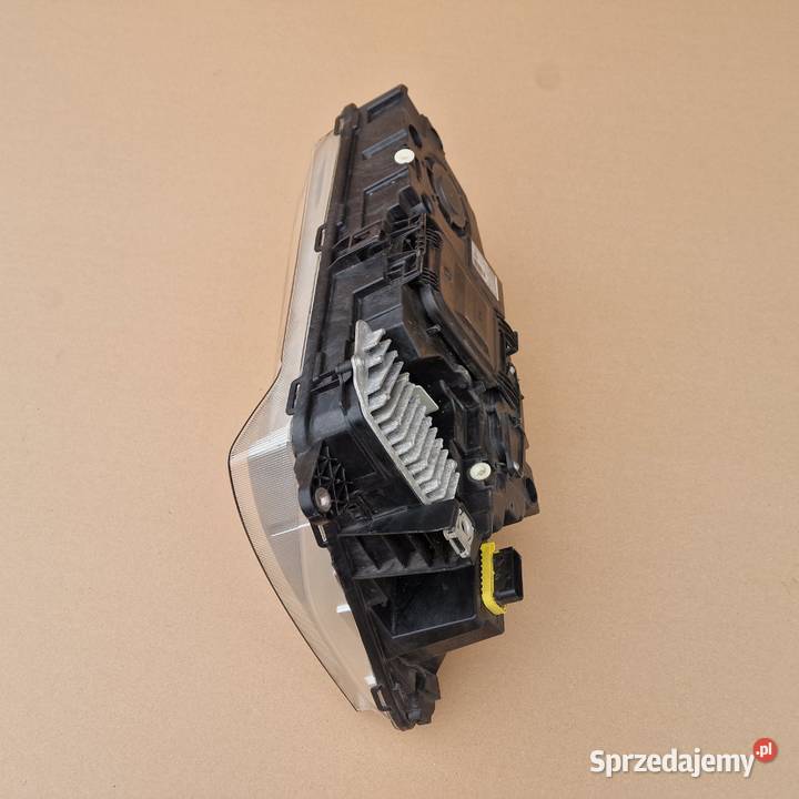 VOLVO FH4 FM4 REFLEKTOR LAMPA LEWA HALOGEN PRZÓD Części samochodowe Bieleń
