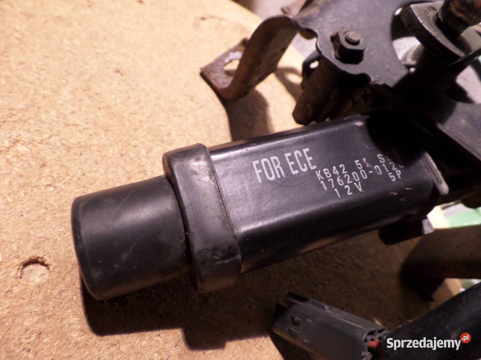 silniczek unoszenia lampy lewej Ford Proe II Rok produkcji 1995 Oświetlenie Sokołów Podlaski