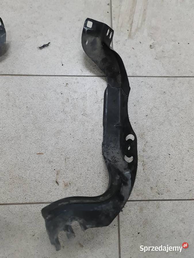 Mocowanie lampy przedniej L R Mercedes SL R230 osobowe